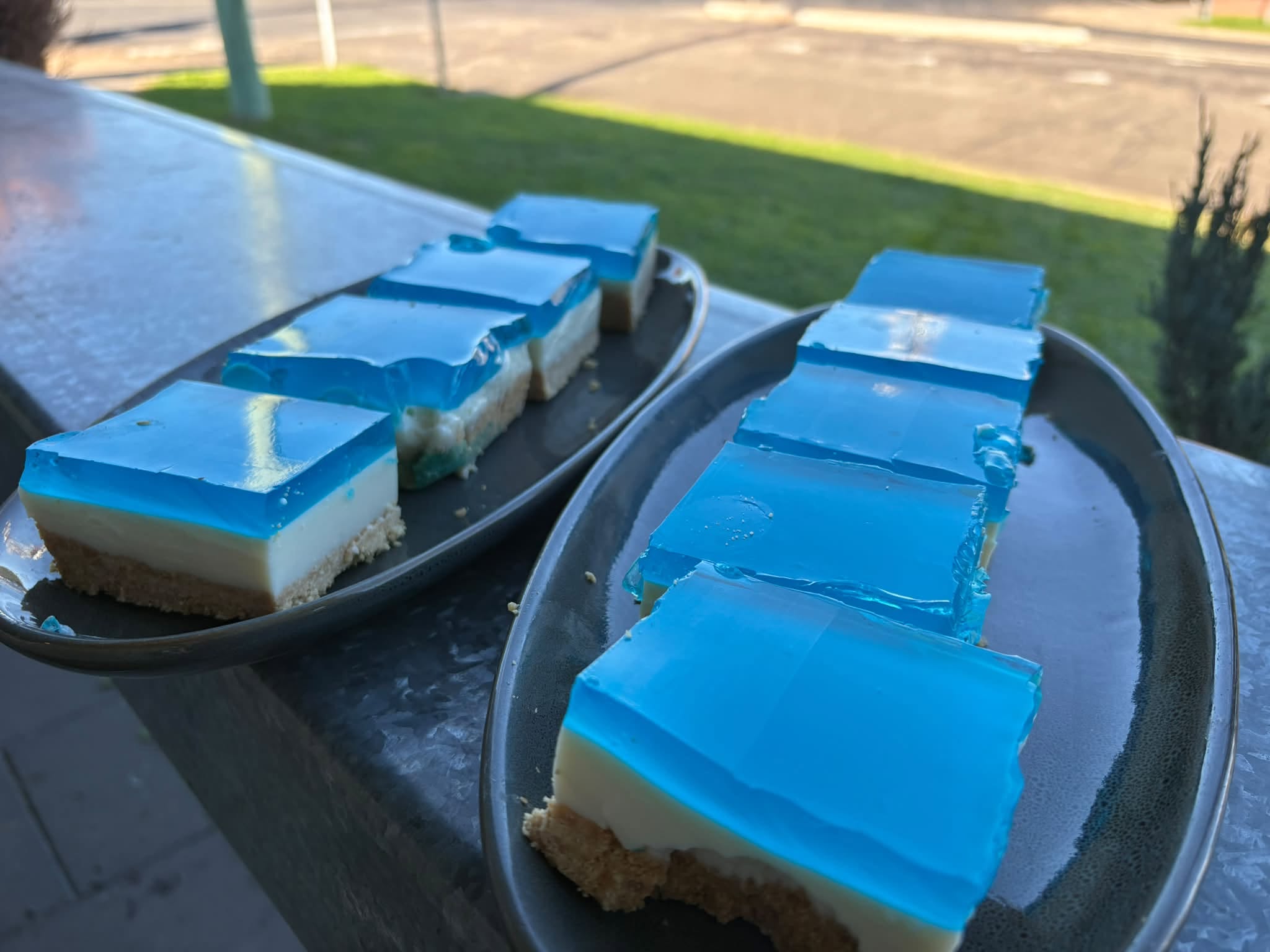 Sweet treat slices arranged on platters